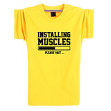 INSTALLING MUSCLES Funny Guy T-Shirt