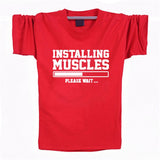 INSTALLING MUSCLES Funny Guy T-Shirt
